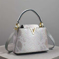 Luxury Snake Pattern Women’s Handbag – Stylish Crossbody Shoulder Bag (2026 Trend)